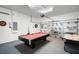 Finished garage transformed into a game room with pool table and air hockey at 509 Cadiz Loop, Davenport, FL 33837