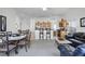 Open floor plan showcasing the kitchen, dining, and living areas, perfect for entertaining and Gathering gatherings at 509 Cadiz Loop, Davenport, FL 33837