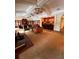 Spacious clubhouse featuring abundant seating area, bar, and ornate decorations at 5160 Conroy Rd # 1414, Orlando, FL 32811