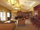 The community clubhouse features a cozy lounge area with comfortable seating and stylish decor at 5160 Conroy Rd # 1414, Orlando, FL 32811