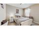 The cozy bedroom features a bed with decorative pillows, and a plush throw blanket at 5457 Animosh Ct, Polk City, FL 33868