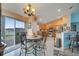 Eat-in kitchen and dining area featuring natural lighting and an outside view at 559 Kingfisher Dr, Kissimmee, FL 34759