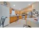 Well-lit kitchen featuring stainless steel appliances, ample cabinetry, and tile flooring at 559 Kingfisher Dr, Kissimmee, FL 34759