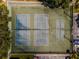 Overhead view of community tennis and shuffleboard courts near the parking area at 6 Escondido Cir # 58, Altamonte Springs, FL 32701
