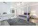 Serene bedroom suite with sleek gray decor and a mirrored vanity area at 6 Escondido Cir # 58, Altamonte Springs, FL 32701