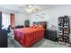 Comfortable bedroom with accent wall decor, a large bed and plenty of storage at 6 Escondido Cir # 58, Altamonte Springs, FL 32701