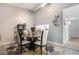 Inviting dining room with table and chairs, flowers, and modern decor at 6 Escondido Cir # 58, Altamonte Springs, FL 32701