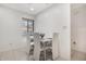 Bright dining room with a table, chairs, and a window with natural light at 6 Escondido Cir # 58, Altamonte Springs, FL 32701