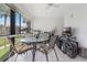 Enclosed lanai with dining table and chairs at 6 Escondido Cir # 58, Altamonte Springs, FL 32701