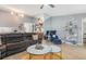 Spacious living room with a bar, modern furniture, and a view of other rooms at 6 Escondido Cir # 58, Altamonte Springs, FL 32701