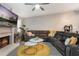 Inviting living room featuring a fireplace, plush seating, and modern decor at 6 Escondido Cir # 58, Altamonte Springs, FL 32701