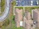 An aerial view of a condo with parking spots near the building at 734 Olympic Cir # 30, Ocoee, FL 34761