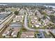 This is an aerial view of a well-maintained property in a lakefront community at 734 Olympic Cir # 30, Ocoee, FL 34761
