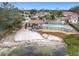 Community pool and gazebo feature a large sandy area perfect for relaxing at 734 Olympic Cir # 30, Ocoee, FL 34761