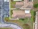 An aerial view of a condo with three parking spots adjacent to the building at 734 Olympic Cir # 30, Ocoee, FL 34761