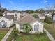 An aerial view of single-Gathering homes in a well-maintained residential neighborhood at 734 Olympic Cir # 30, Ocoee, FL 34761