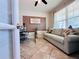 Cozy office space with comfortable sofa and desk, perfect for working from home at 8628 Dufferin Ln, Orlando, FL 32832