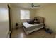 Bedroom with a large window letting in plenty of light and a ceiling fan to keep you cool at 996 Dolphin Dr, Winter Garden, FL 34787
