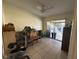 Spare room featuring tile flooring, a ceiling fan, and sliding glass doors at 996 Dolphin Dr, Winter Garden, FL 34787