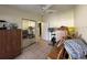 A spare room with tile flooring, a ceiling fan, and a sliding mirror closet at 996 Dolphin Dr, Winter Garden, FL 34787