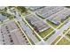 Aerial view of townhomes showcasing the property layout, landscaping, and neighborhood at 10414 Folly Beach Rd, Orlando, FL 32827