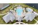 Aerial view of the community pool, lounge area, and beautiful landscaping at 10414 Folly Beach Rd, Orlando, FL 32827