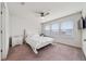 Bright bedroom features a ceiling fan, carpet, and lots of natural light at 10414 Folly Beach Rd, Orlando, FL 32827