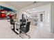 Modern dining area adjacent to an open kitchen with stainless steel appliances at 10414 Folly Beach Rd, Orlando, FL 32827