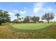 Well-maintained putting green surrounded by lush greenery at 11454 Wakeworth St, Orlando, FL 32836