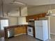 Bright kitchen featuring classic cabinets, a full range of appliances and ample counter space at 138 Inconnu Ct, Kissimmee, FL 34759