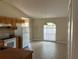 Bright kitchen and dining area featuring tile floors and ample natural light at 138 Inconnu Ct, Kissimmee, FL 34759