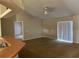Inviting living room with an open layout and natural light leads to the kitchen area at 138 Inconnu Ct, Kissimmee, FL 34759