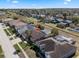 Aerial view of a home with an arrow pointing to the house at 141 Prestwick Dr, Davenport, FL 33897