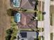 This attractive home has a screened-in pool and backyard, located on a desirable street at 141 Prestwick Dr, Davenport, FL 33897