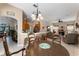 Open dining area with seamless flow between living spaces and abundant natural light at 141 Prestwick Dr, Davenport, FL 33897