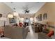 Comfortable living room featuring cozy seating arrangements and a relaxing atmosphere at 141 Prestwick Dr, Davenport, FL 33897