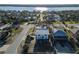Aerial view of a charming neighborhood with waterfront views and lush landscaping at 2061 S Peninsula Dr, Daytona Beach, FL 32118