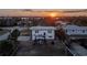 Aerial view of the backyard featuring a pergola and outdoor seating area at 2061 S Peninsula Dr, Daytona Beach, FL 32118