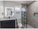 Updated bathroom featuring black fixtures and a glass-enclosed shower at 2061 S Peninsula Dr, Daytona Beach, FL 32118