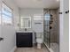 Renovated bathroom with gray-toned tile, modern vanity, and glass shower at 2061 S Peninsula Dr, Daytona Beach, FL 32118