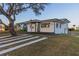 A charming house with a modern design, complimented by a well-maintained lawn at 2061 S Peninsula Dr, Daytona Beach, FL 32118