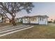 Beautiful residence featuring fresh paint and a modern design, complete with a well-kept lawn at 2061 S Peninsula Dr, Daytona Beach, FL 32118