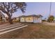 Charming two-story home with a well-maintained yard, and minimalist walkways at 2061 S Peninsula Dr, Daytona Beach, FL 32118