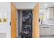 Convenient laundry area with stackable washer and dryer, and modern white cabinets at 2061 S Peninsula Dr, Daytona Beach, FL 32118
