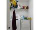Laundry room featuring a washer, dryer, and storage shelf at 250 Sir Phillips Dr, Davenport, FL 33837