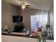 Spacious living room with vaulted ceiling and sliding glass doors to lanai at 250 Sir Phillips Dr, Davenport, FL 33837