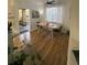 Open concept view of the dining area, kitchen, and patio at 2558 Robert Trent Jones Dr # 1412, Orlando, FL 32835