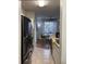 Bright kitchen featuring modern appliances and a cozy dining area with natural light at 2558 Robert Trent Jones Dr # 1412, Orlando, FL 32835