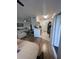 Open concept view of the kitchen, dining area, and living room at 2558 Robert Trent Jones Dr # 1412, Orlando, FL 32835