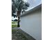 A modern, freshly painted home exterior featuring clean lines and a well-maintained landscape for curb appeal at 2812 Tower Rock St, Kissimmee, FL 34758